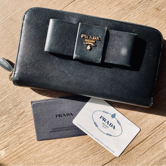 Prada Handbags - Prada Saffiano Leather Bow Tie Long Zippy Wallet in Black w. Gold Hardware & COA